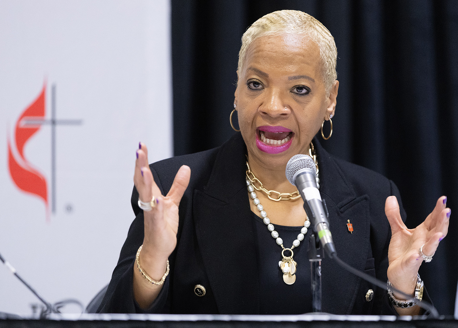 Bishop Tracy Smith Malone speaks during a news conference after delegates to the 2024 United Methodist General Conference in Charlotte, N.C., voted in favor of a Worldwide Regionalization plan. The body voted for an amendment to the denomination’s constitution that will now go before annual conference voters for potential ratification. (Photo by Mike DuBose, UM News)