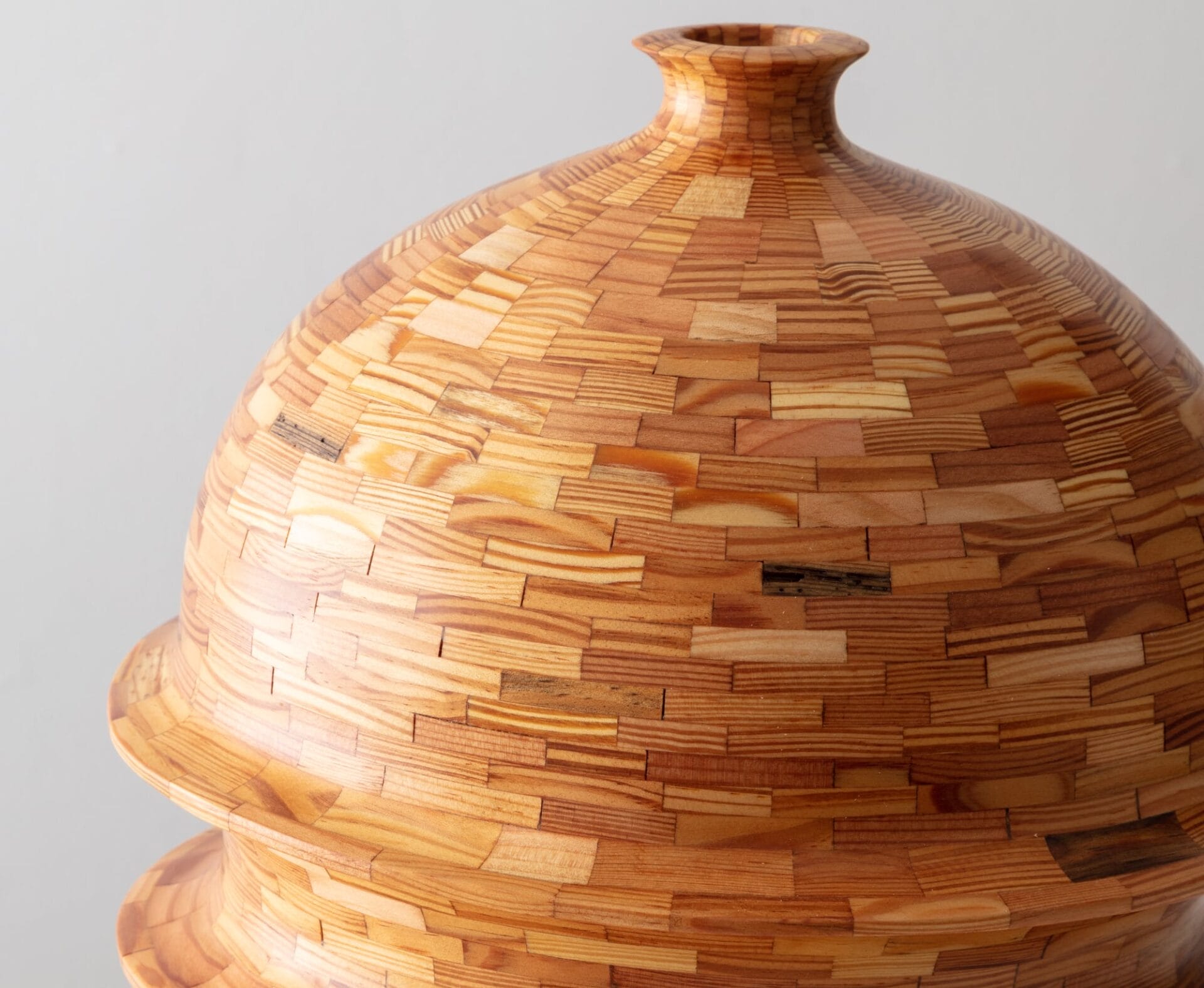 Salvaged Scraps of Wood Nest Together in Richard Haining’s Elegant Curved Vessels — Colossal