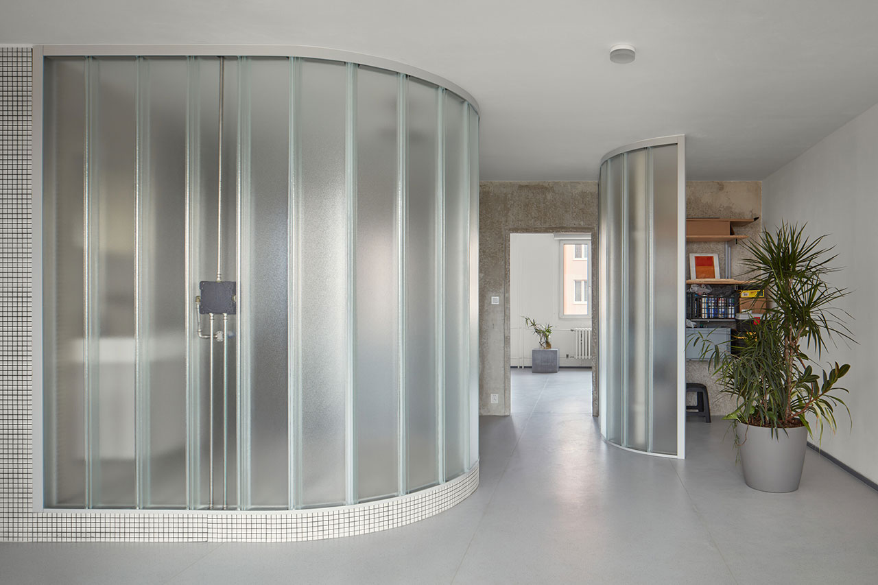 Sculptor Apartment in Prague With Curved Translucent Glass Walls