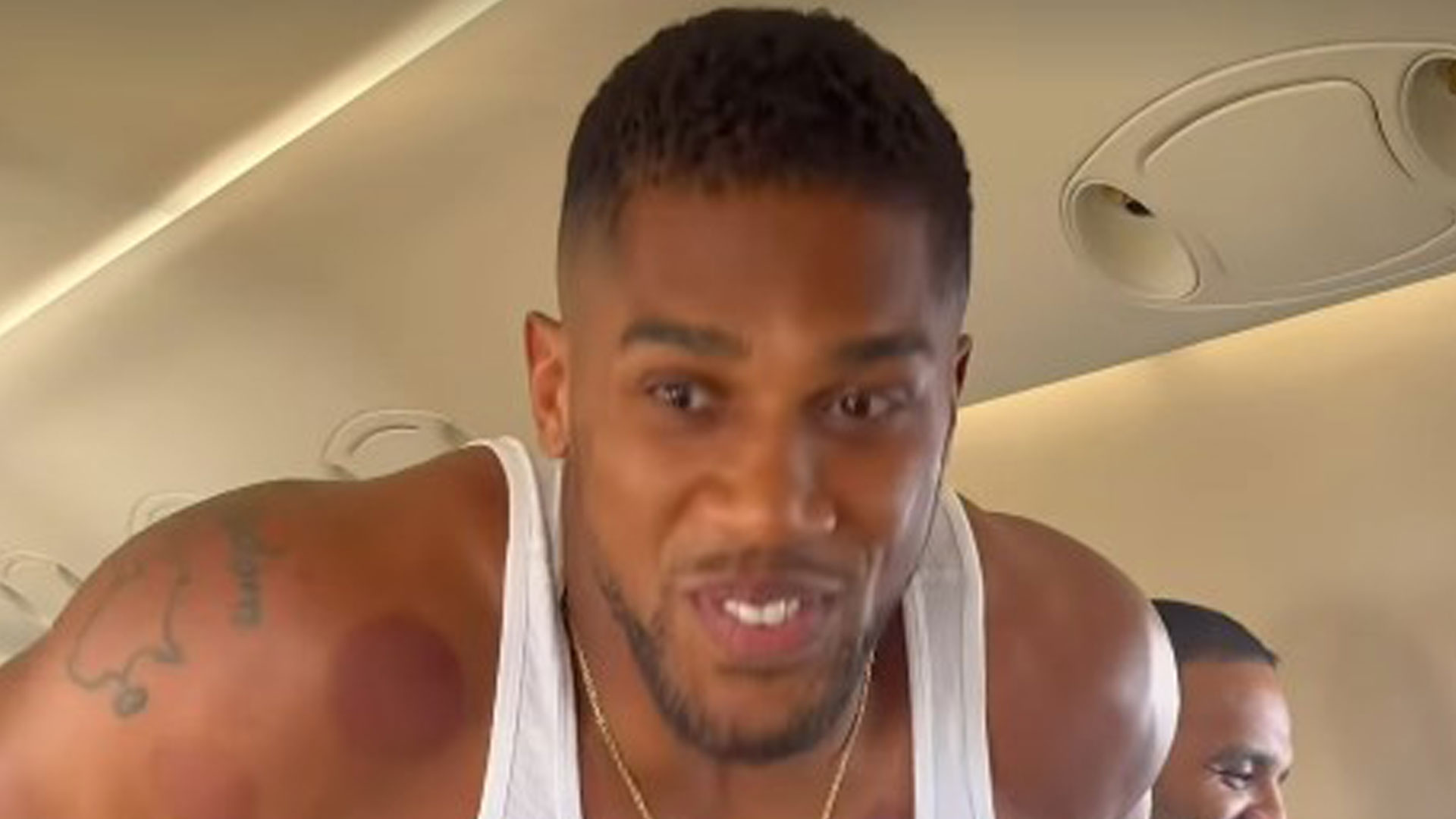 Anthony Joshua shows the training never stops as boxer does 30 press-ups on PRIVATE JET as all-Brit clash edges closer