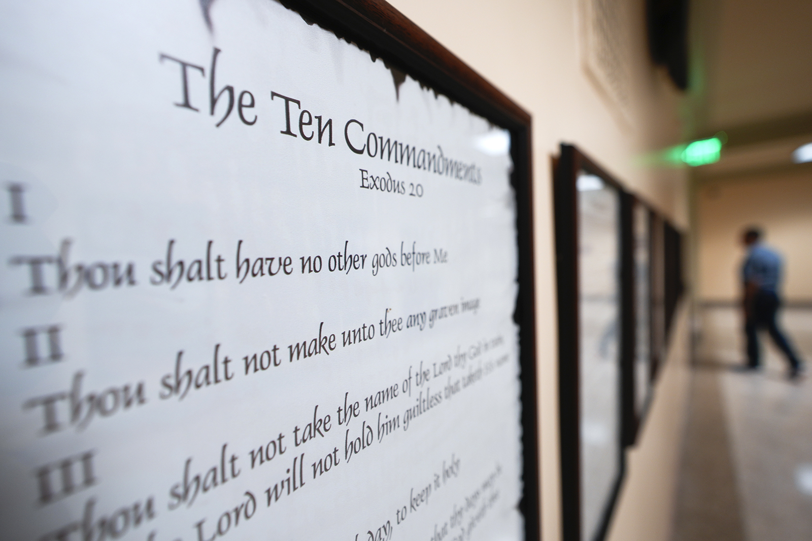 A copy of the Ten Commandments is posted along with other historical documents in a hallway at the Georgia State Capitol Building Thursday, June 20, 2024, in Atlanta. Louisiana has become the first state in the country to require the Ten Commandments be displayed in all public schools. (AP Photo/John Bazemore)