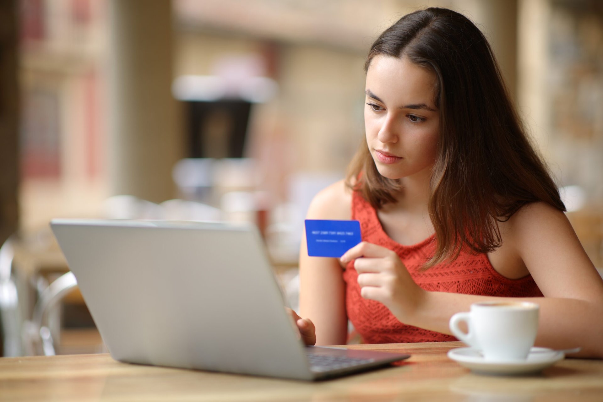 Young woman purchasing something on the internet