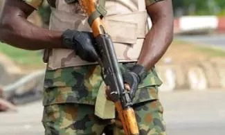 Wife Of Nigerian Soldier Shot In Sokoto Barracks During Protest Against Poor Feeding, Others, Says Husband Is Dying Amid Poor Care – TheNGblog