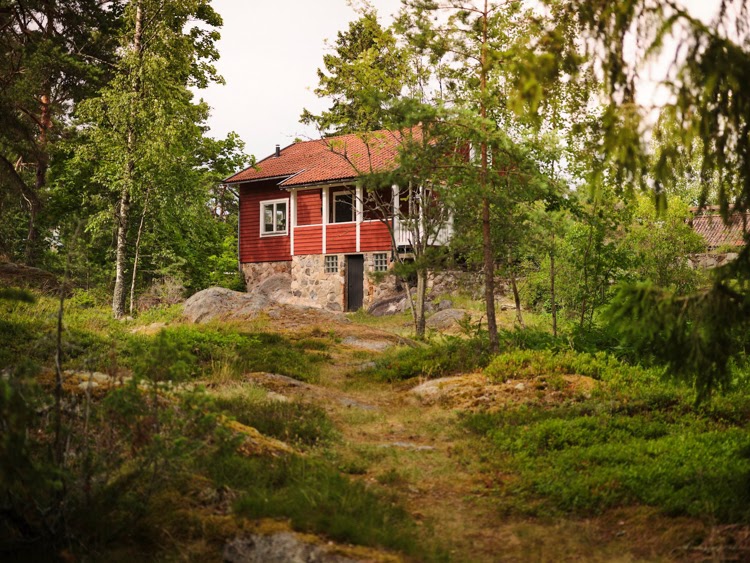 A Traditional Swedish Cottage by the Sea with a Splash of Colour