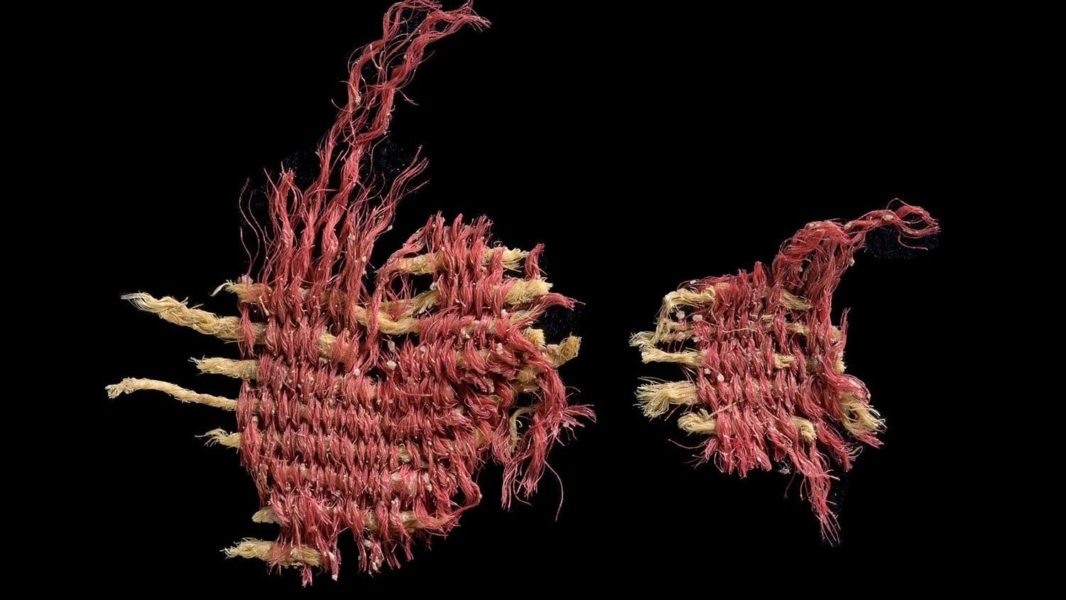 two small frayed edge weavings with brown and red fibers