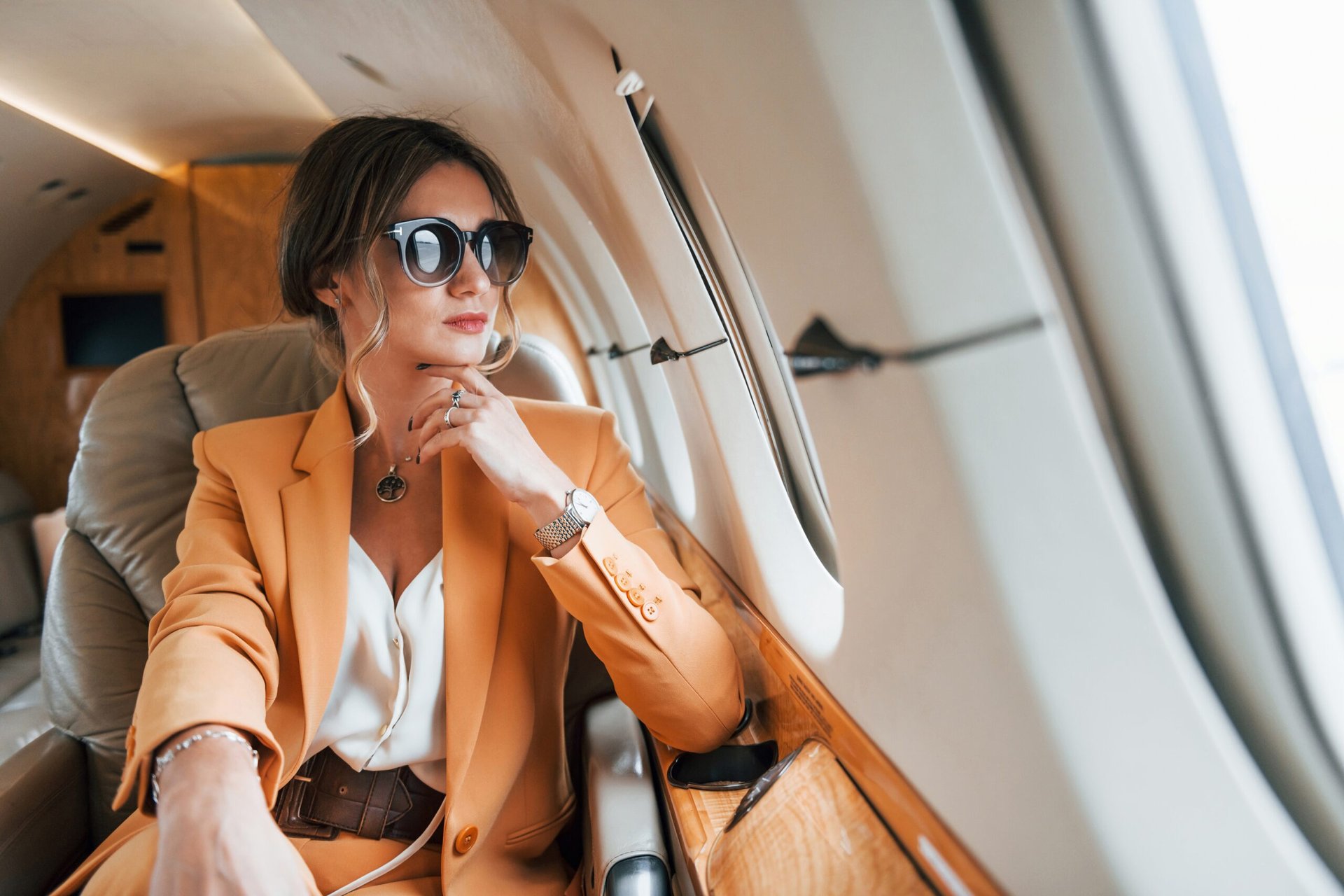 Wealthy woman on a private jet