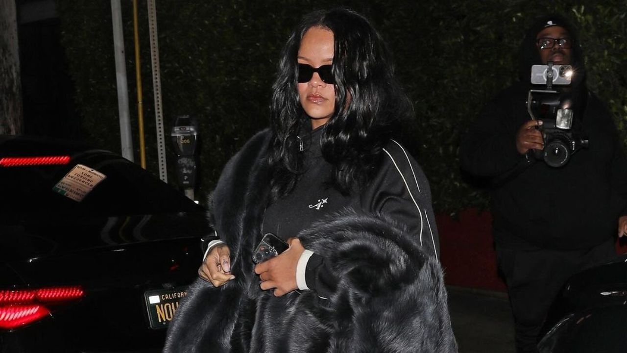 Rihanna Stepped Out to Dinner in LA in a Black Awake New York Track Suit, with a Black Bottega Veneta Faux Fur Shawl and Brown Puma Sneakers