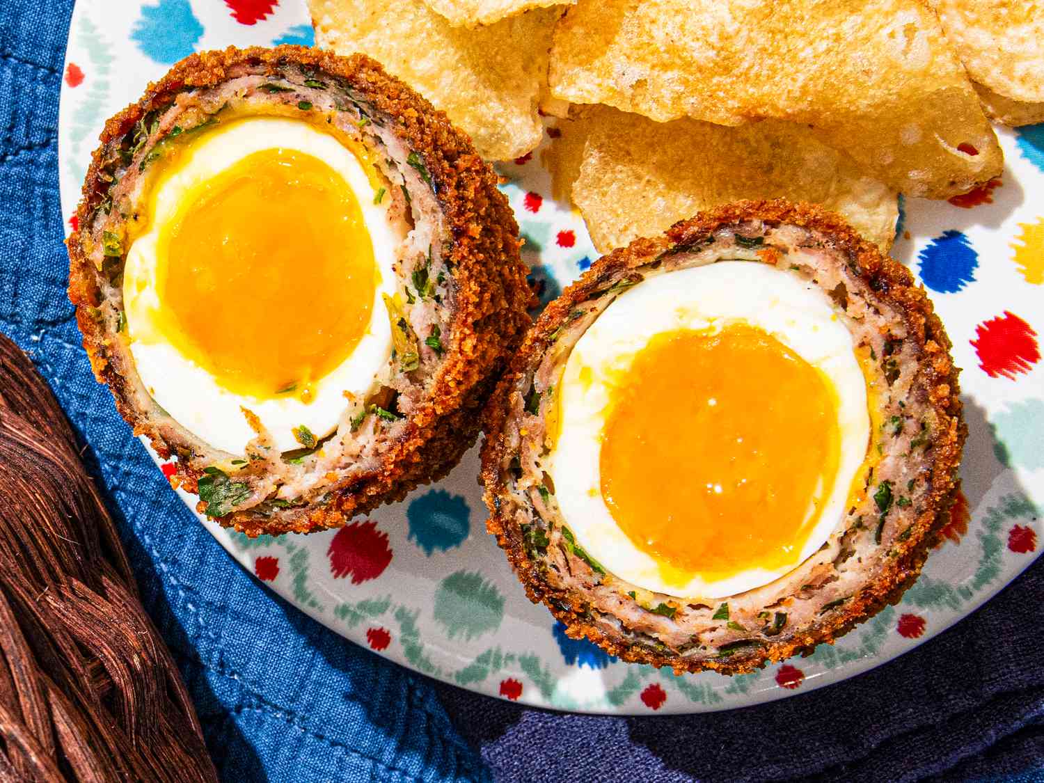 This Classic British Egg Recipe Stars Jammy Yolks and Juicy Sausage