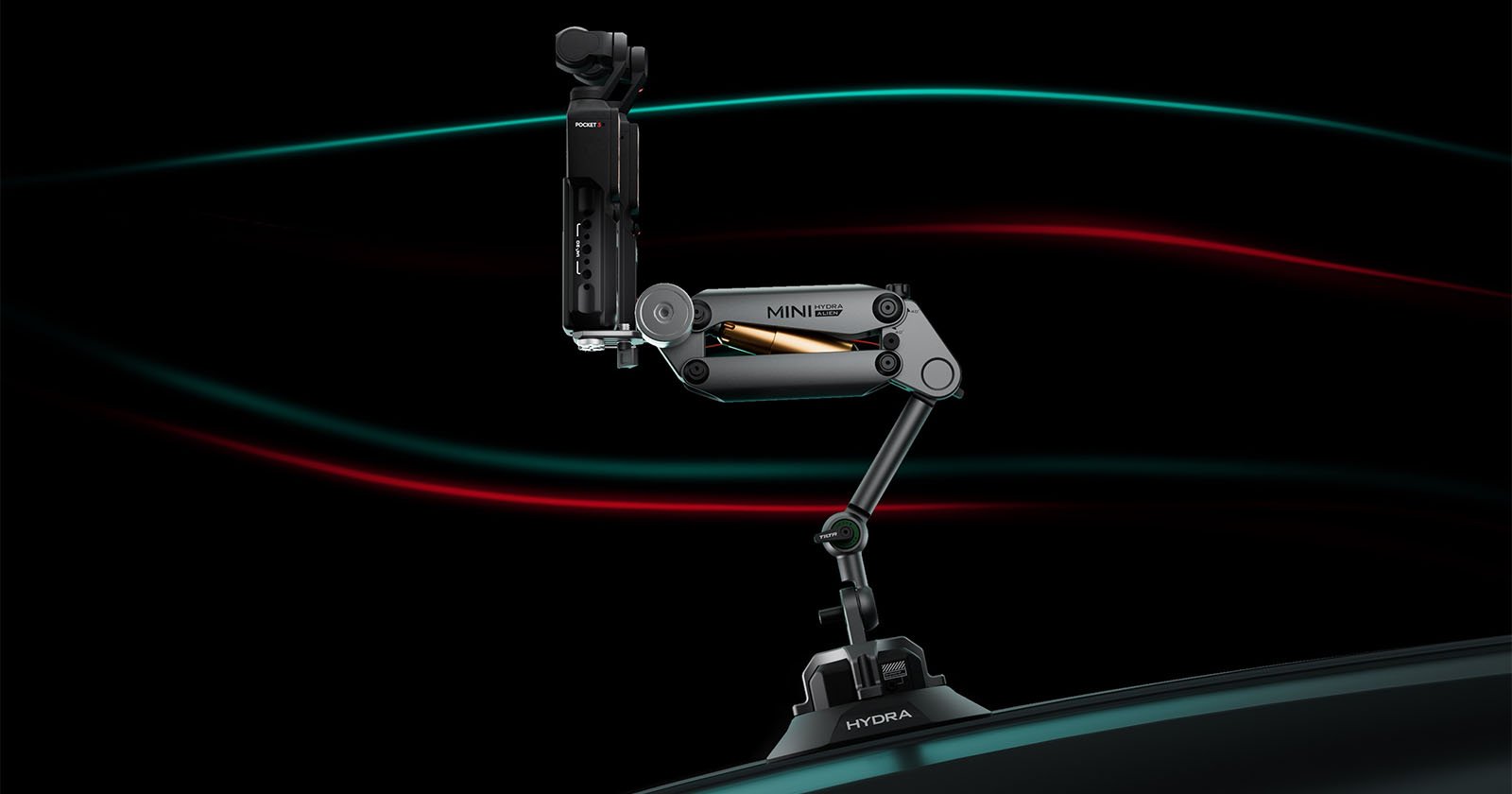 Image of a Hydra Mini camera support arm mounted on a surface. The mechanical arm features multiple hinges for flexibility and a camera attached at the top. The background is dark with streaks of red and green light.